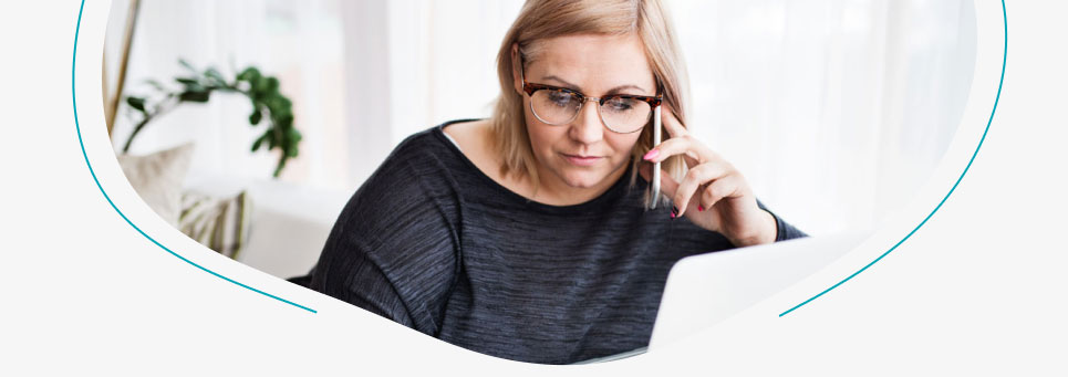 Psychosocial-recovery-coach-talking-on-phone-writing