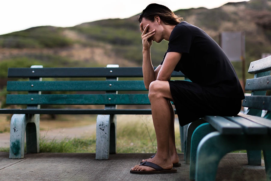 Depressed young man who suffers from addiction.