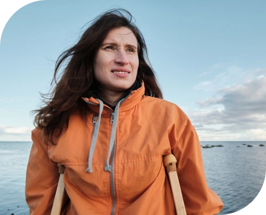 A woman with a work place injury at the beach